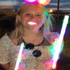 Trinity Dawson got
into the festive spirit
at the rodeo with an
assortment of glowing
decorations.